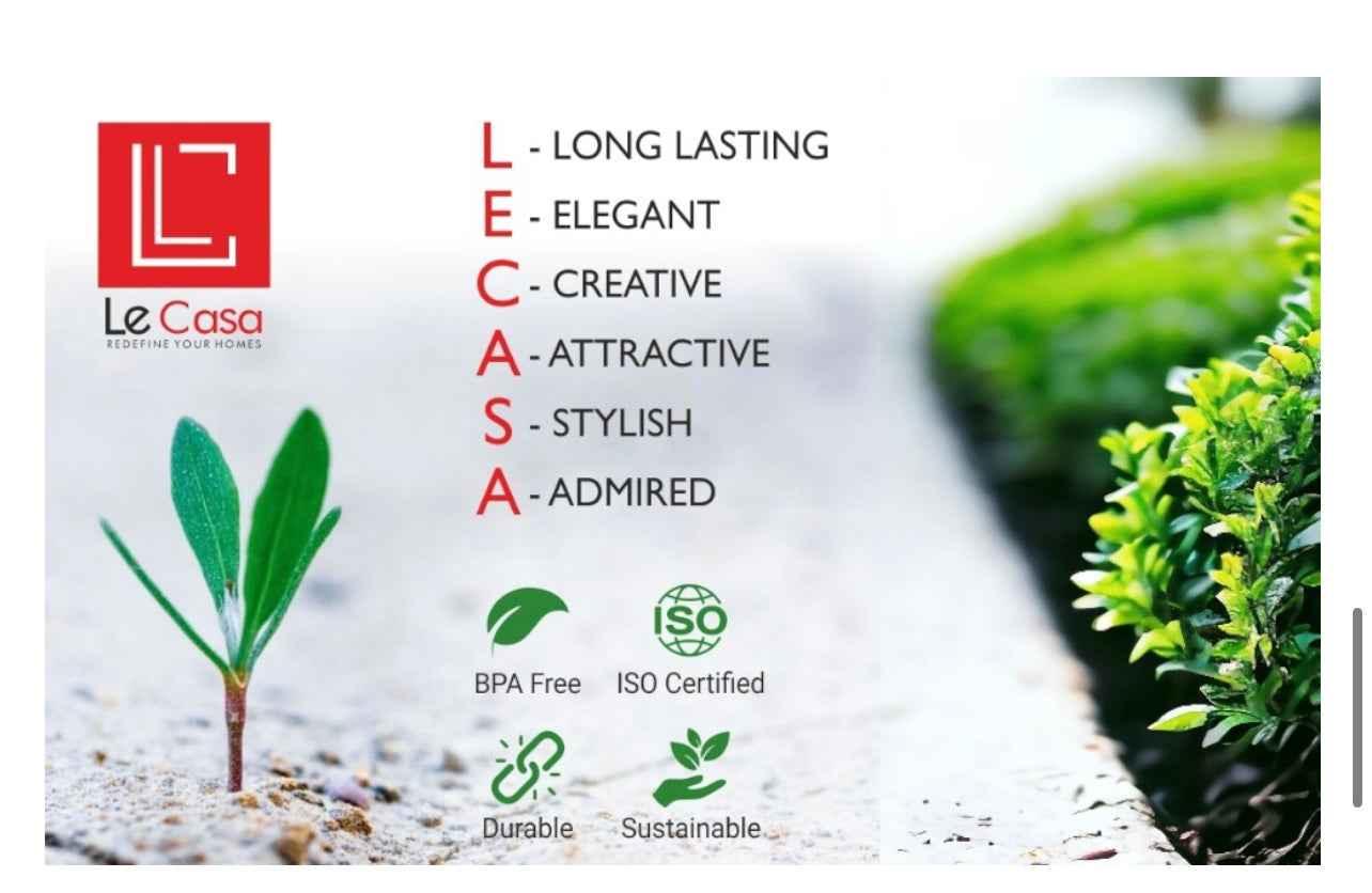 Green plant sprout in soil beside green bushes, highlighting BPA free, ISO certified, durable, sustainable qualities.