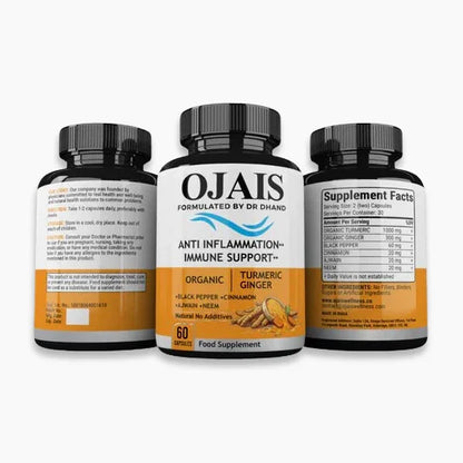 Anti-inflammatory immune support supplement bottles with organic turmeric and ginger capsules